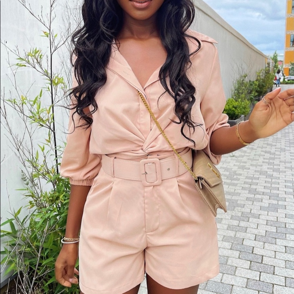 2 piece mixed size set. Large top and medium bottom. Never been worn.